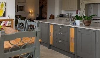 Grey shaker-style kitchen within a residential extension in Timbersbrook, Congleton.